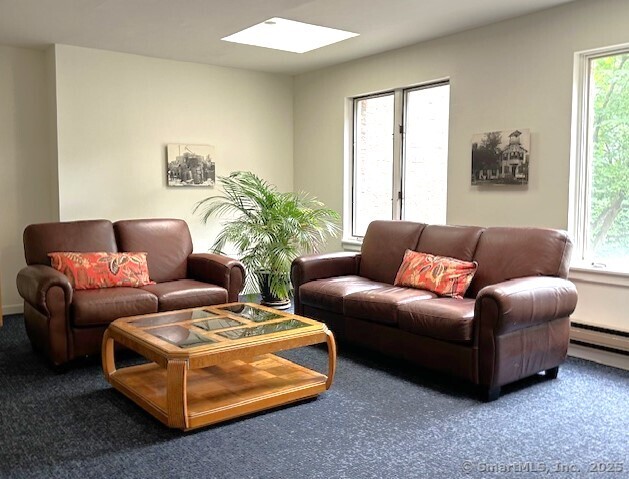 500 Prospect Street, Unit 1E New Haven, CT 06511 - Photo 13 of 18 a living room with furniture and a large window