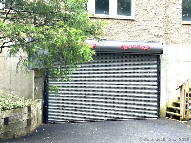 500 Prospect Street, Unit 1E New Haven, CT 06511 - Photo 16 of 18 a view of a brick house with an outdoor space
