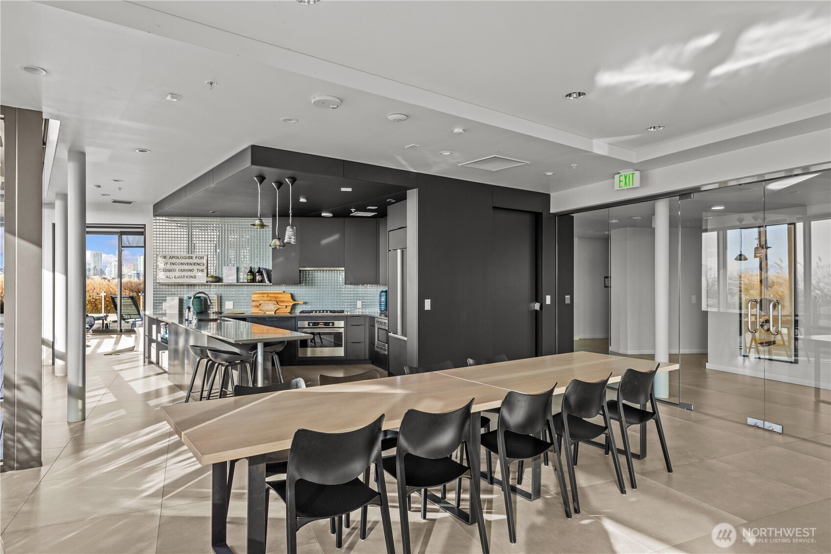 590 1st Avenue South, Unit 715 Seattle, WA 98104 - Photo 28 of 39 a dining area with furniture and a large window