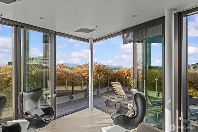 a view of a balcony with ocean view