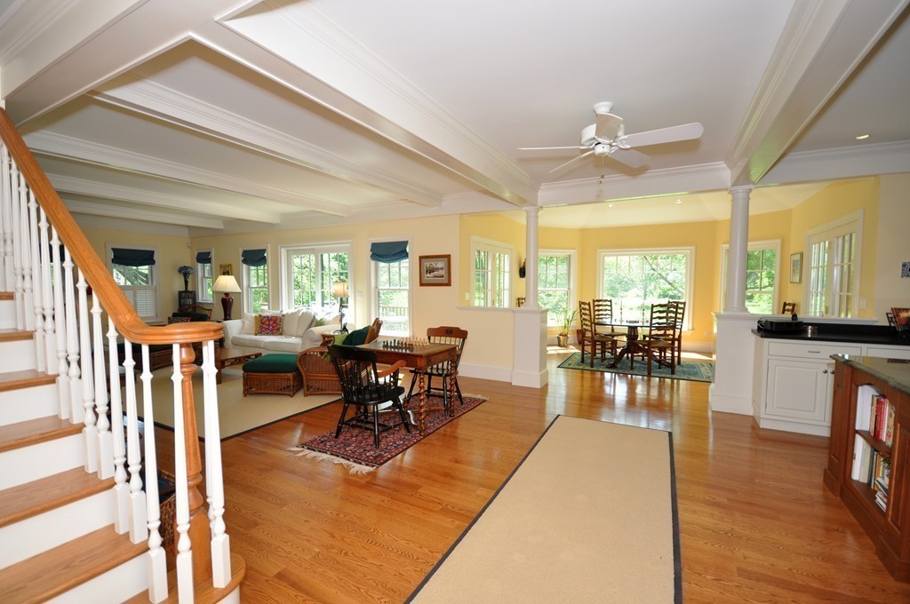 1643 Monument Street Concord, MA 01742 - Photo 15 of 27 a living room with furniture dining table and a large window