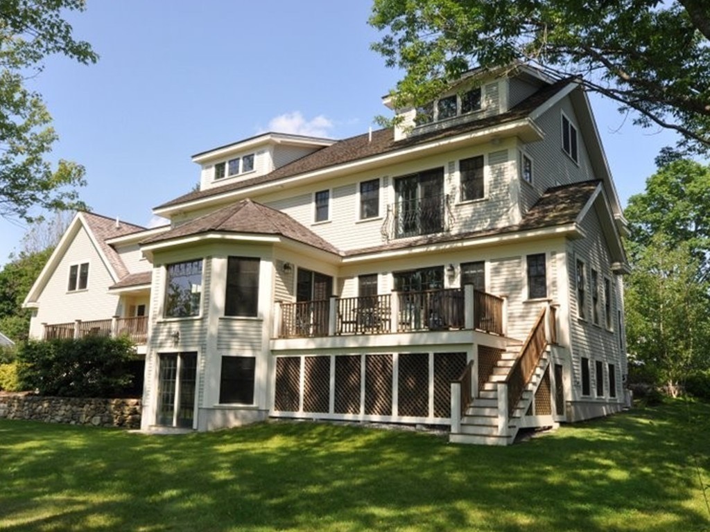 1643 Monument Street Concord, MA 01742 - Photo 26 of 27 a front view of a house with a yard