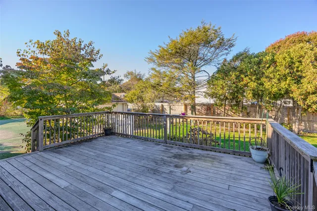 a view of deck with a trees
