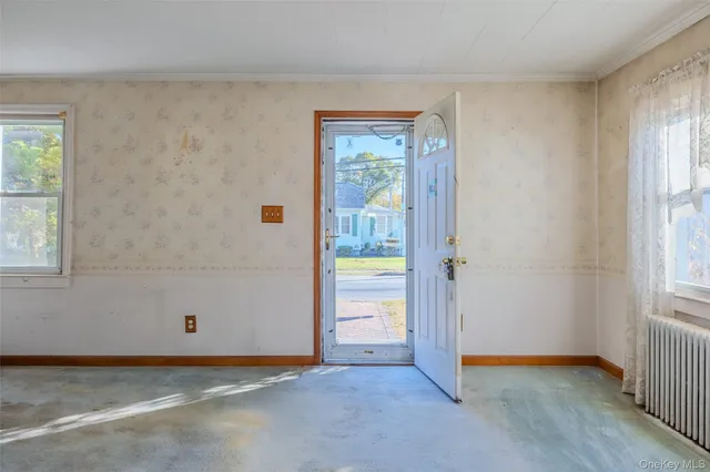 a view of an empty room with window