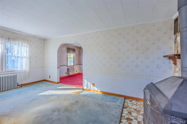 a view of an empty room with window