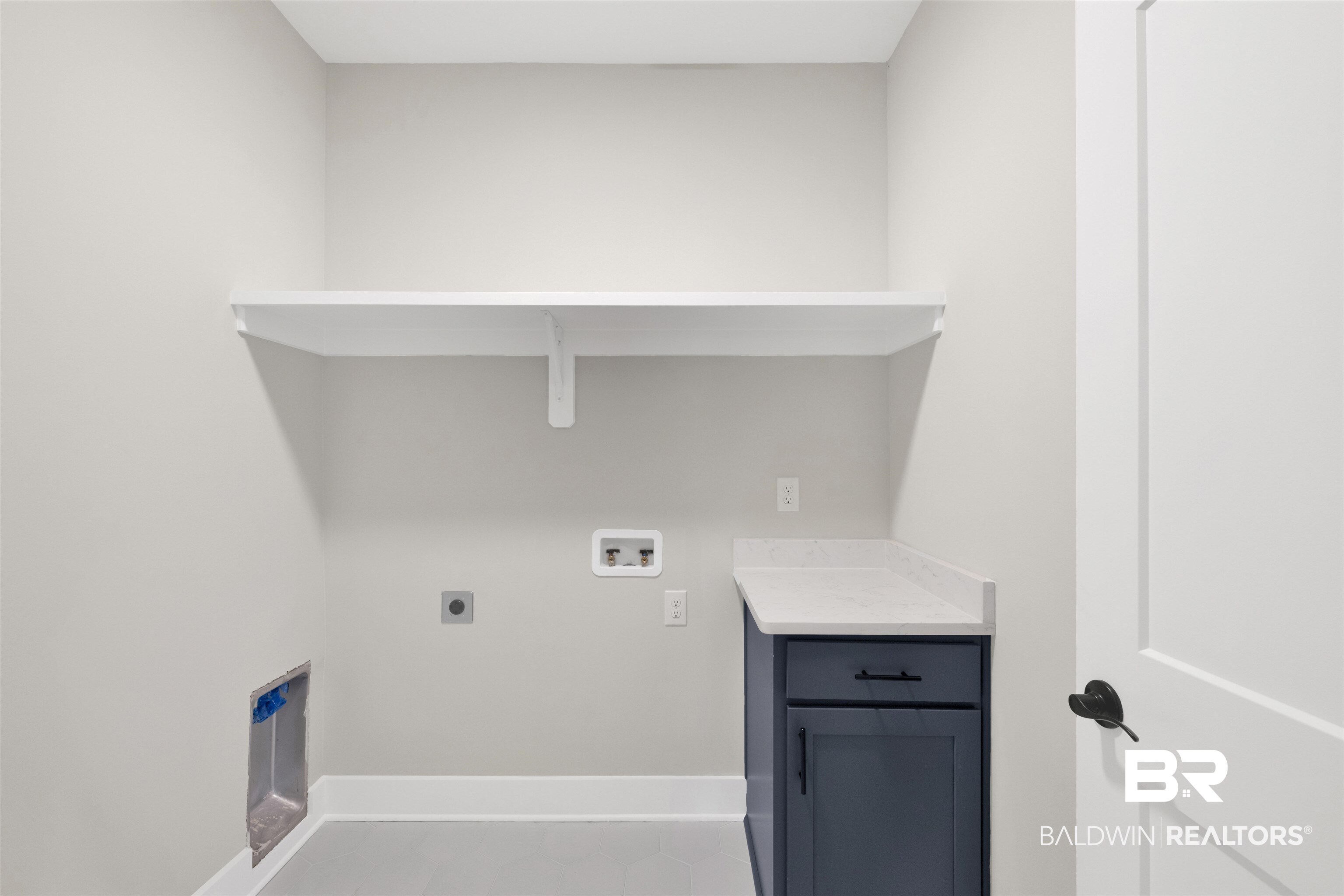 27315 Patch Pl Loop Daphne, AL 36526 - Photo 14 of 43 Laundry area with washer hookup, electric dryer hookup, and cabinet space