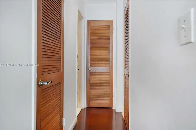 a view of a bathroom that has a glass door
