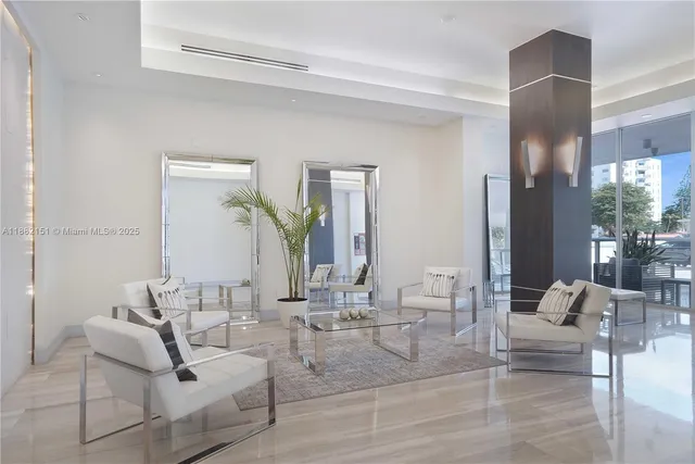 a view of hallway with wooden floor