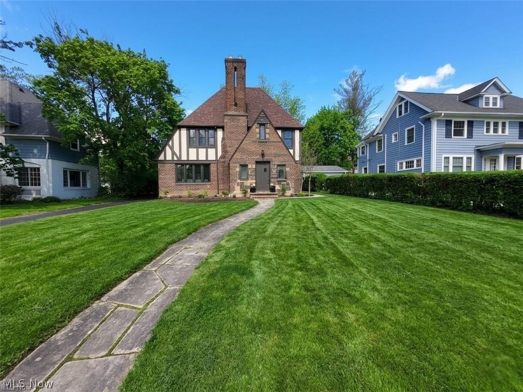 3145 Huntington Road Shaker Heights, OH 44120 - Photo 1 of 28 Tudor-style residence with brick and half-timbering facade