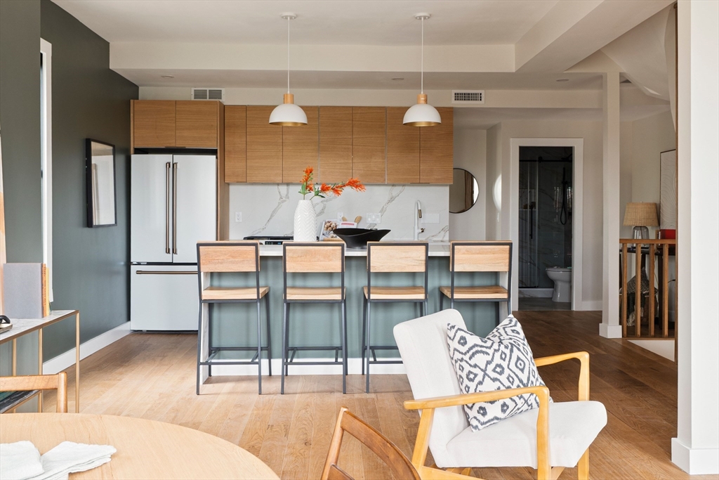 16 Yale Terrace, Unit 2 Boston, MA 02130 - Photo 11 of 32 a living room with furniture and a table