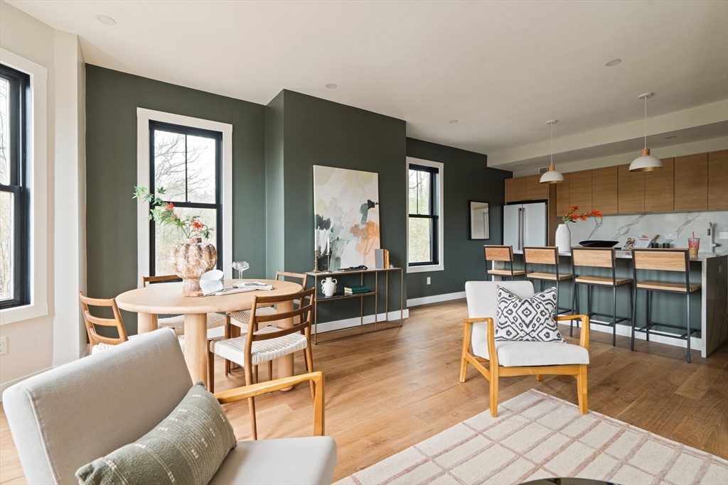 16 Yale Terrace, Unit 2 Boston, MA 02130 - Photo 12 of 32 a living room with furniture and a large window