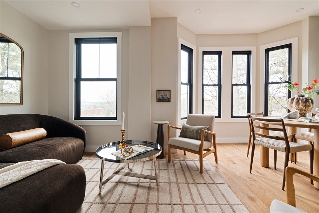 16 Yale Terrace, Unit 2 Boston, MA 02130 - Photo 15 of 32 a living room with furniture and a two windows
