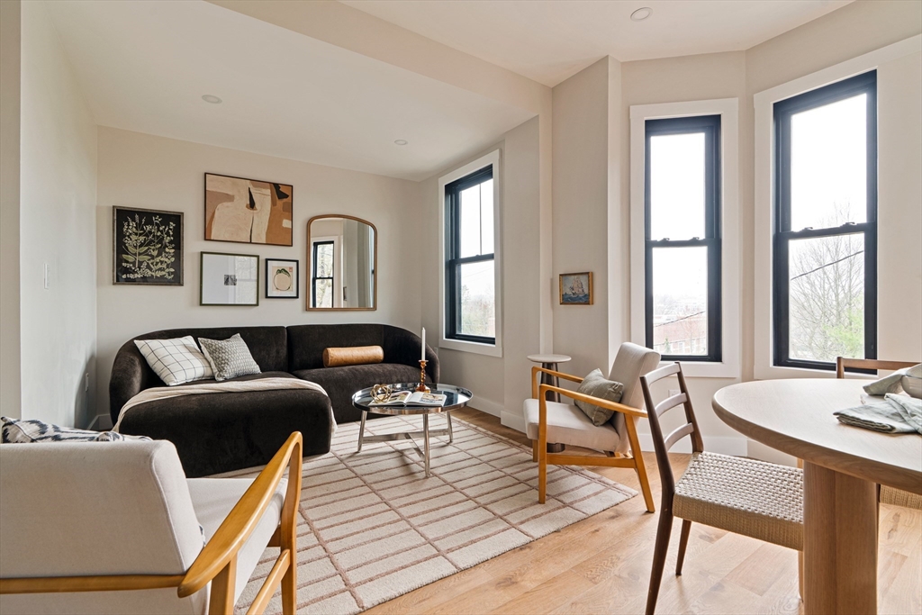 16 Yale Terrace, Unit 2 Boston, MA 02130 - Photo 16 of 32 a living room with furniture and large windows