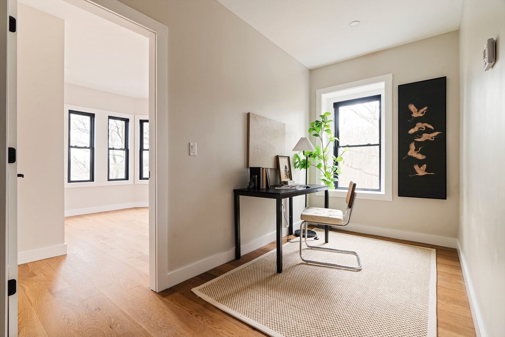 16 Yale Terrace, Unit 2 Boston, MA 02130 - Photo 28 of 32 a view of a livingroom with furniture and a window