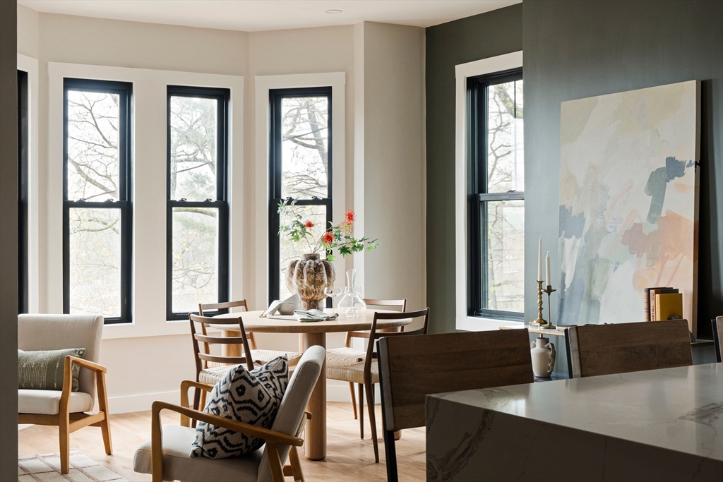 16 Yale Terrace, Unit 2 Boston, MA 02130 - Photo 10 of 32 a view of a dining room with furniture and large windows
