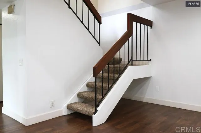 a view of entryway with wooden floor
