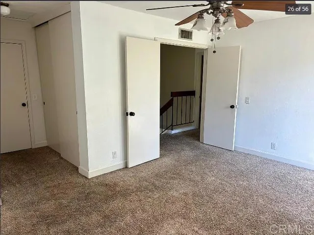 an empty room with a bathroom