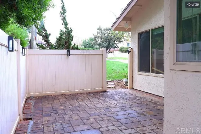 a view of a backyard with garden