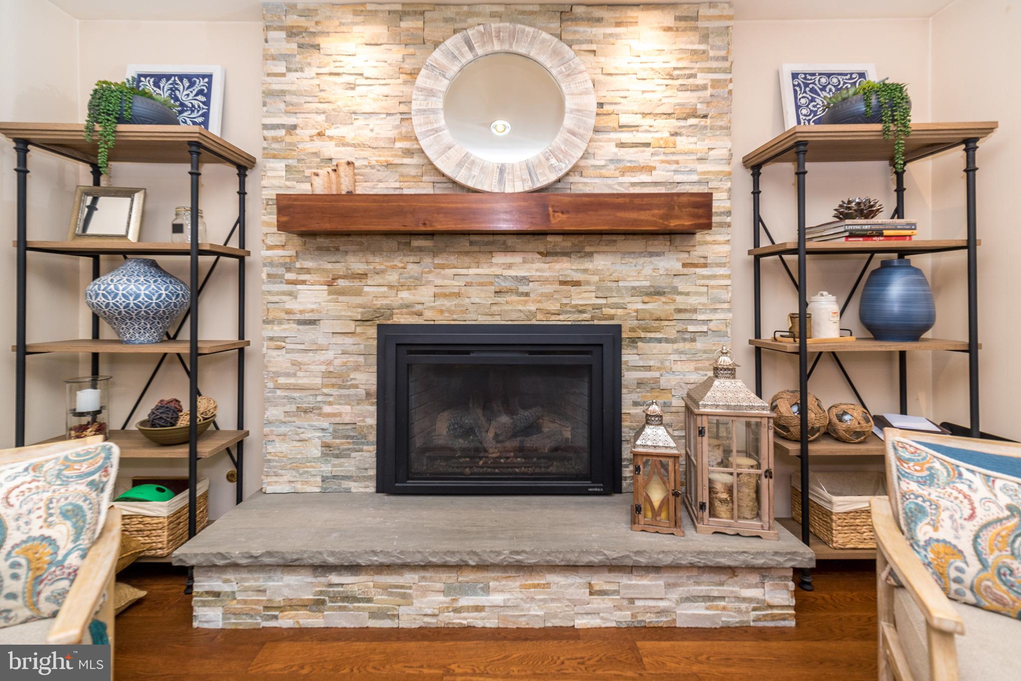 227 Knapp Road Lansdale, PA 19446 - Photo 15 of 41 Propane fireplace with stone surround