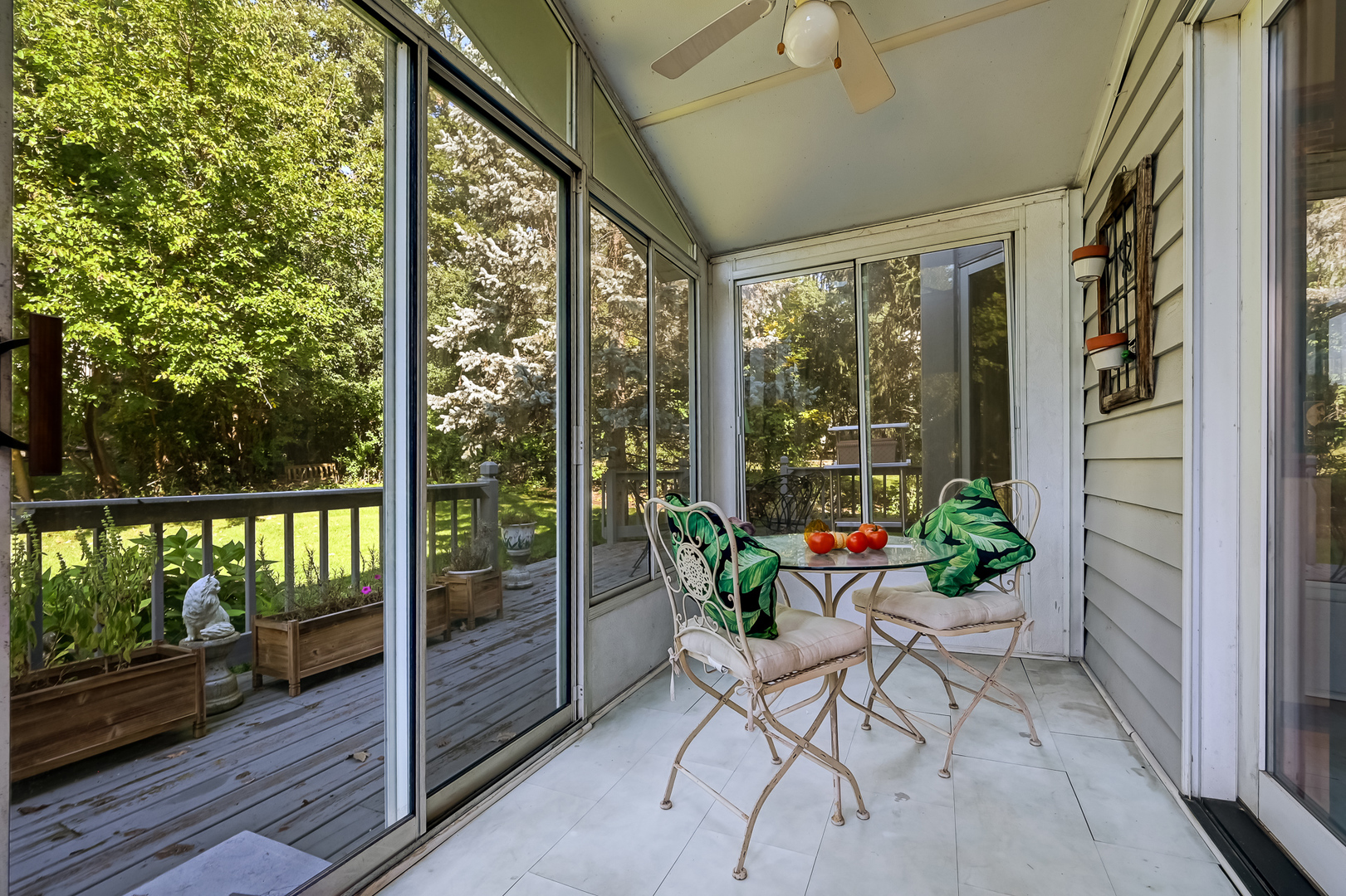 8826 Carlisle Court Darien, IL 60561 - Photo 11 of 36 a view of a porch with furniture and garden