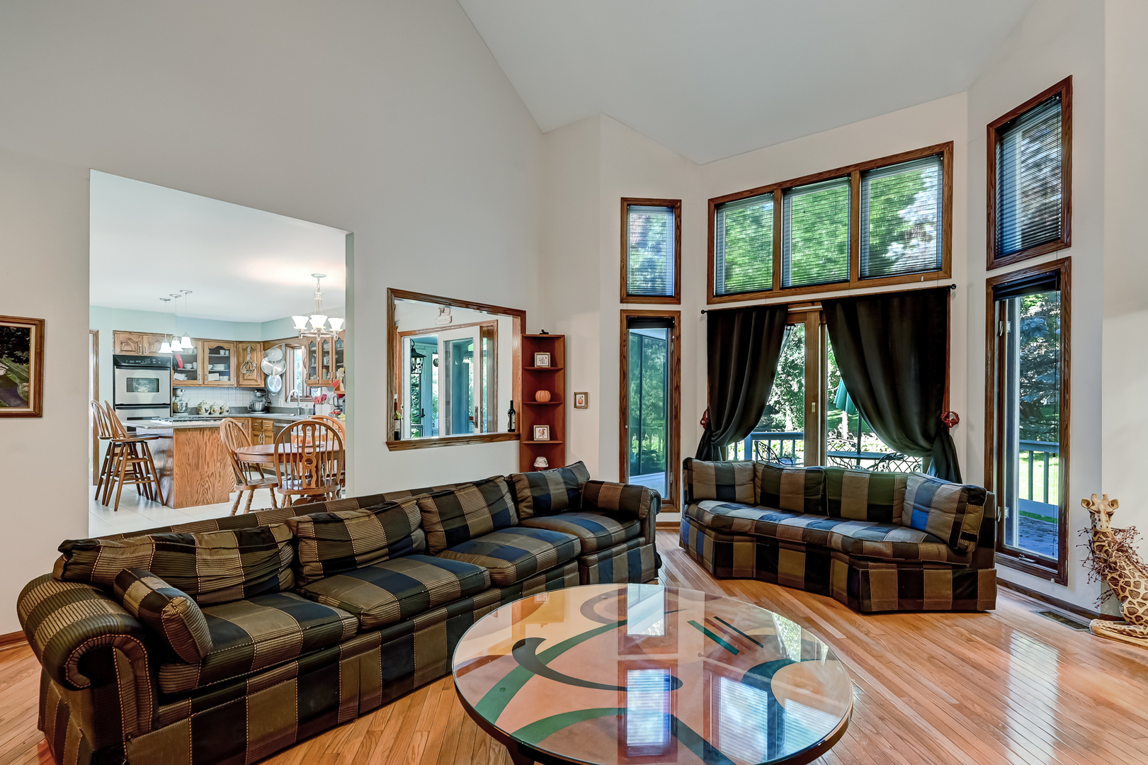 8826 Carlisle Court Darien, IL 60561 - Photo 13 of 36 a living room with furniture large window and wooden floor