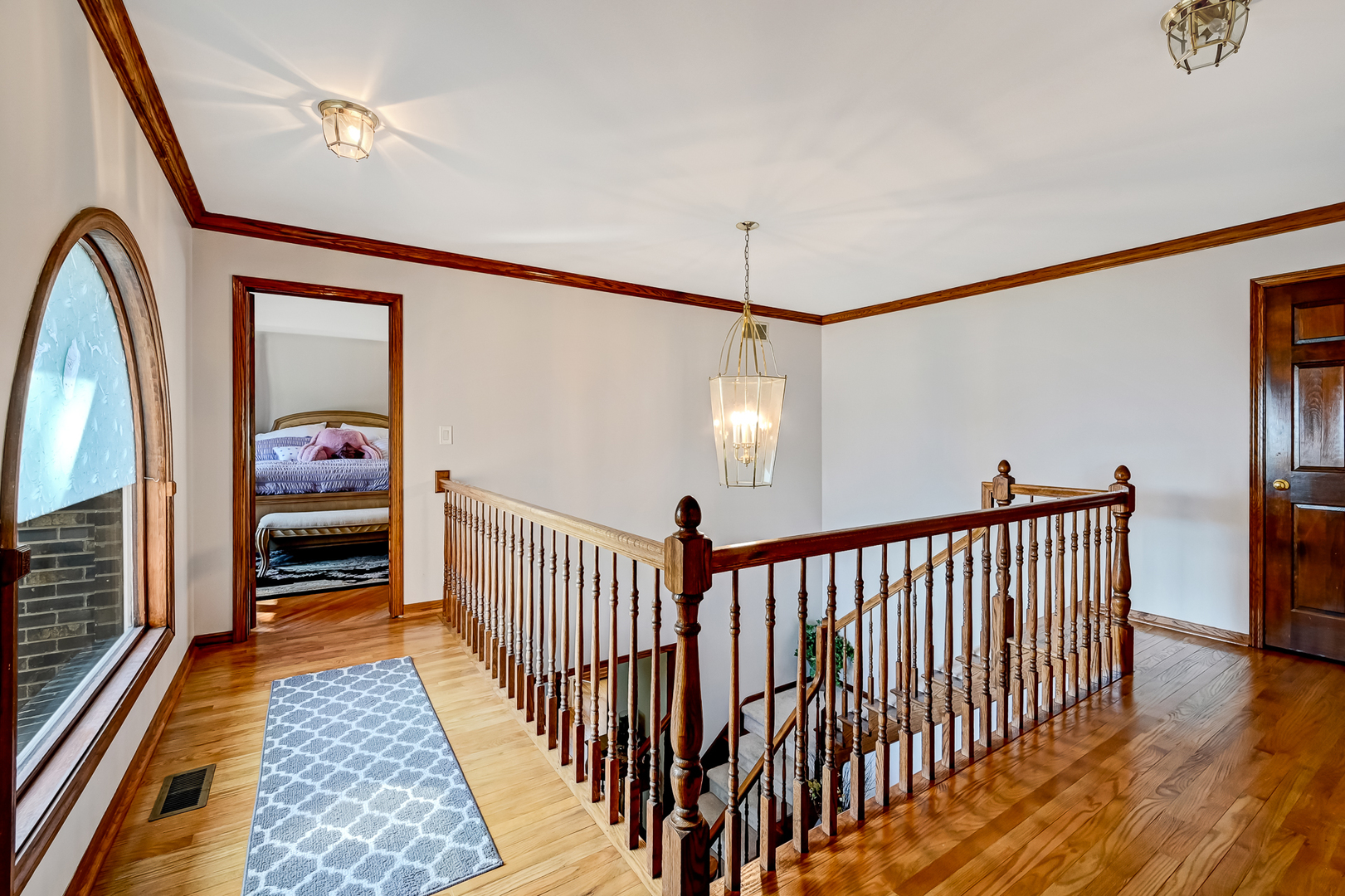 8826 Carlisle Court Darien, IL 60561 - Photo 17 of 36 a view of hallway with livingroom