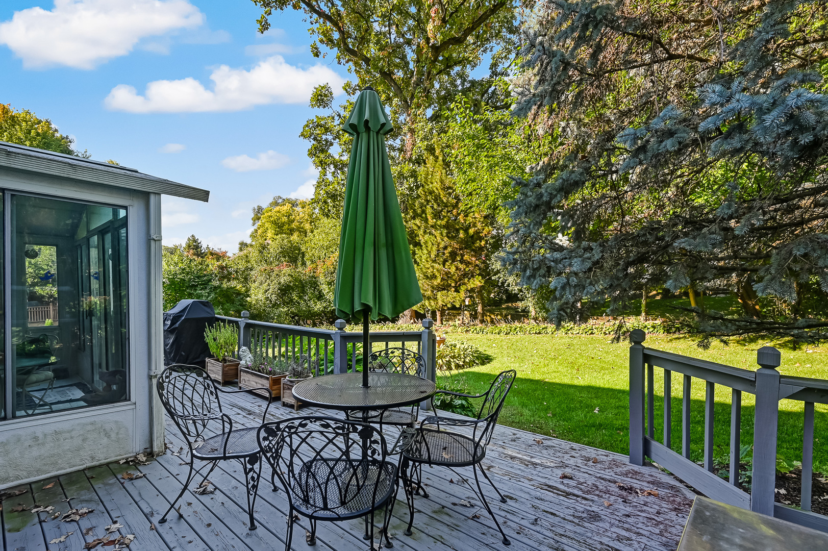 8826 Carlisle Court Darien, IL 60561 - Photo 32 of 36 a view of a patio with a table chairs and a table