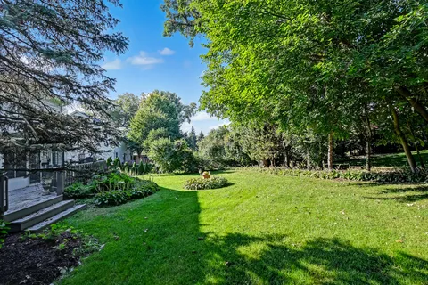 a view of backyard with green space