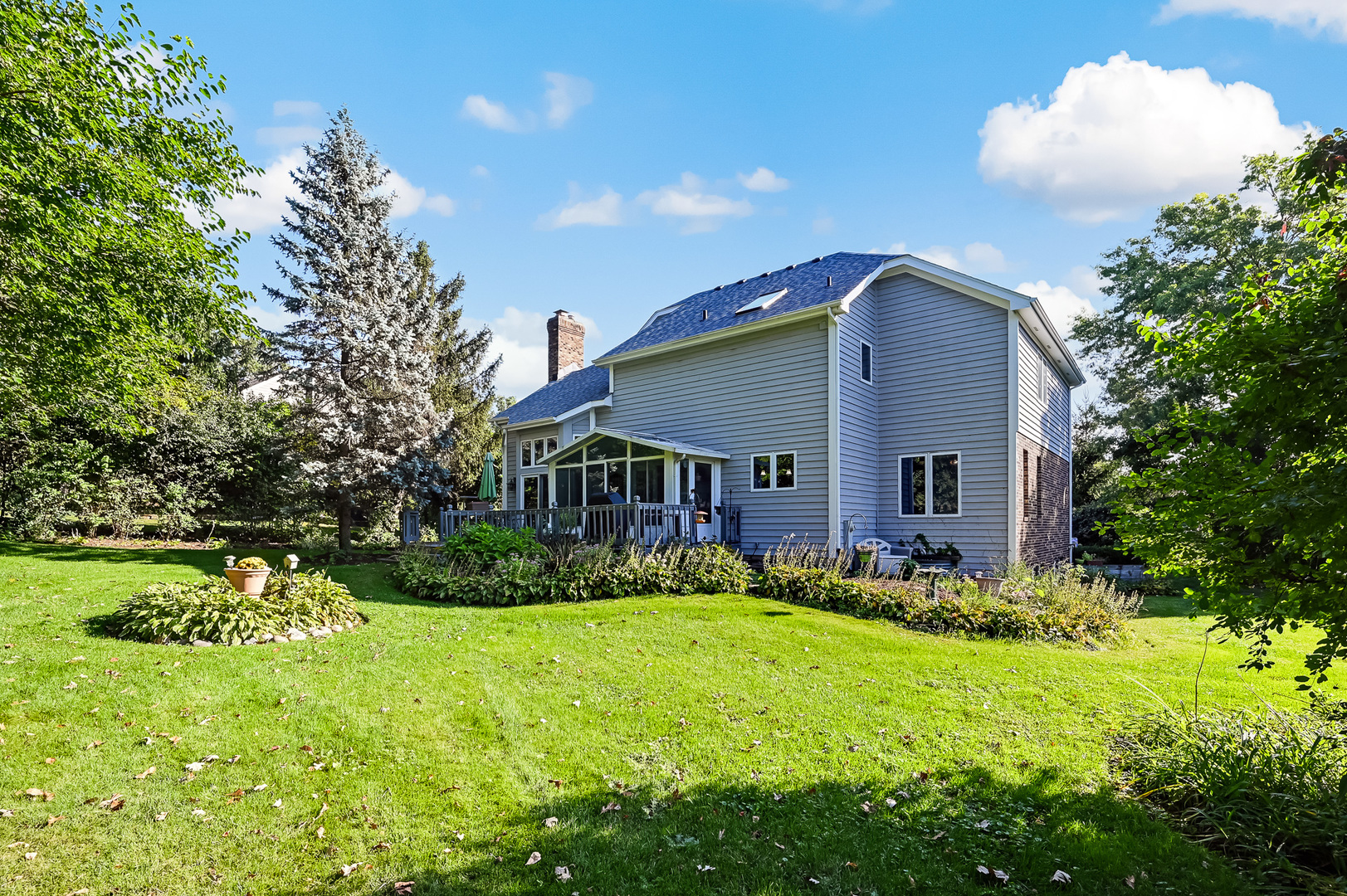 8826 Carlisle Court Darien, IL 60561 - Photo 35 of 36 a view of house with yard