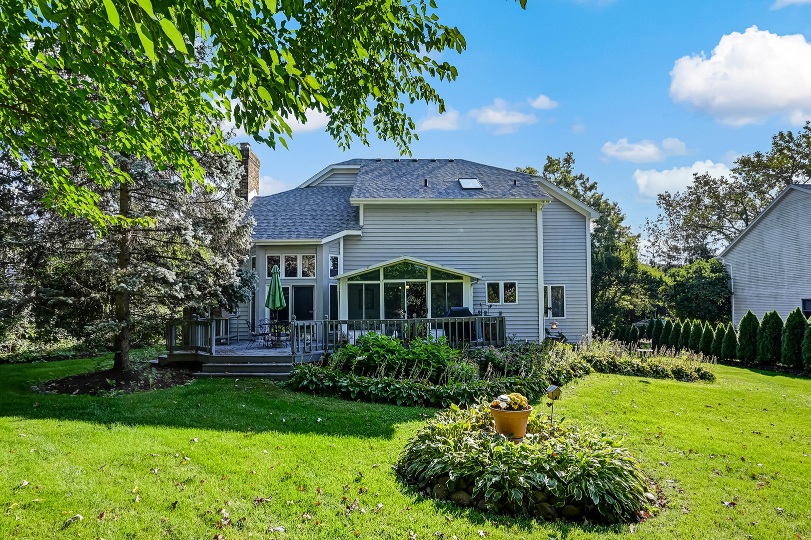 8826 Carlisle Court Darien, IL 60561 - Photo 36 of 36 a front view of a house with garden