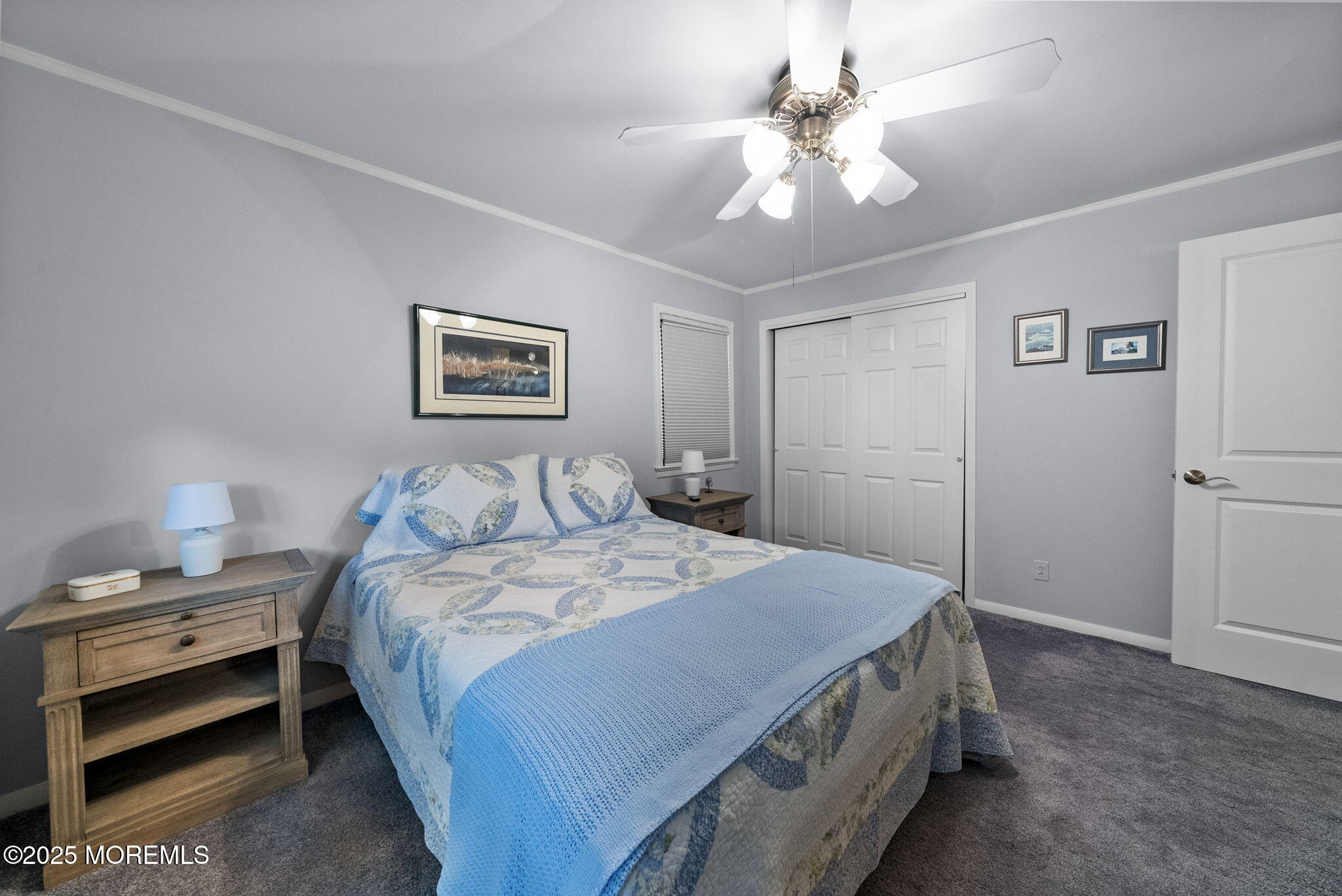 72 Broadway Road Freehold, NJ 07728 - Photo 25 of 37 a bedroom with a bed and a chandelier