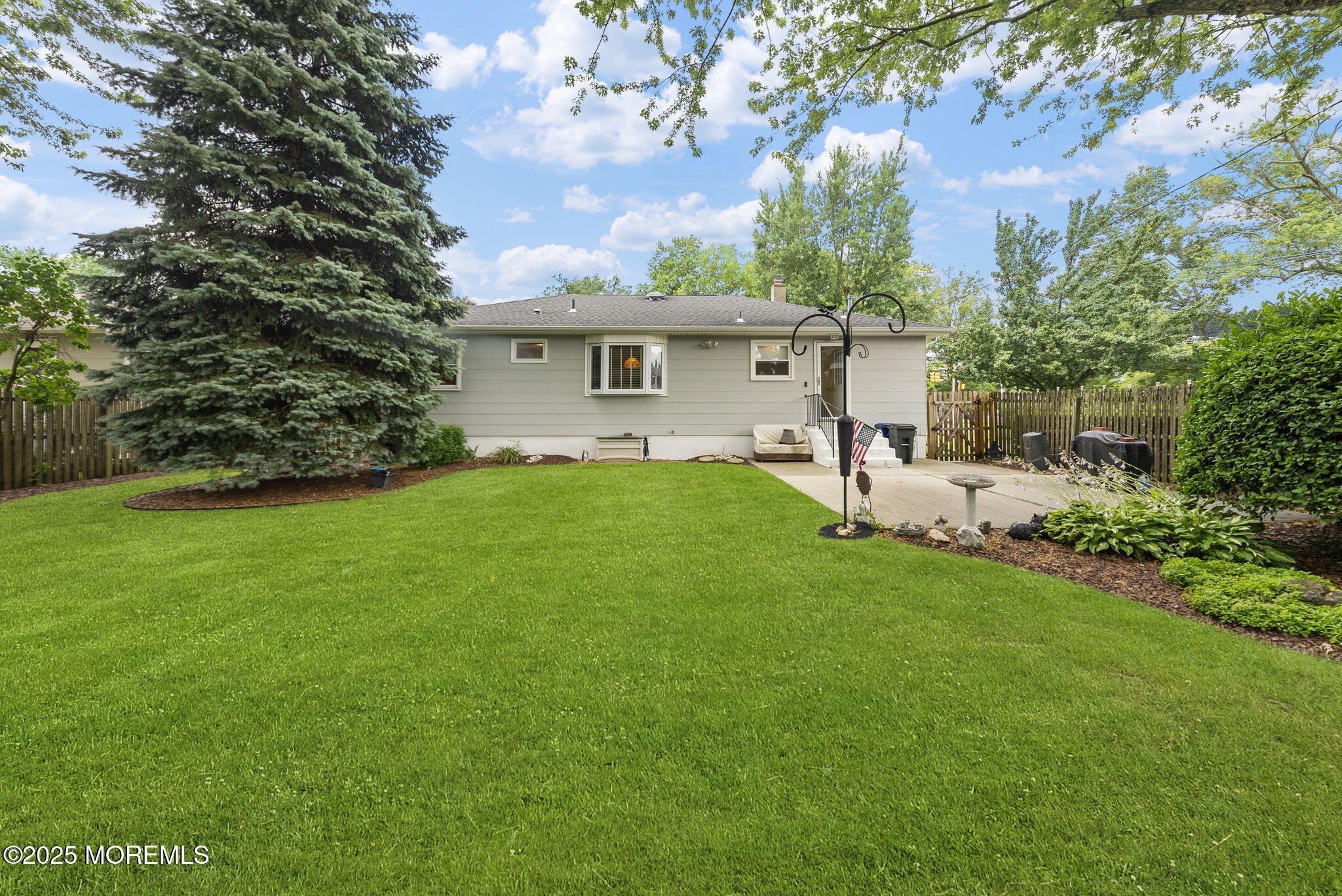 72 Broadway Road Freehold, NJ 07728 - Photo 34 of 37 a view of a house with backyard and a tree