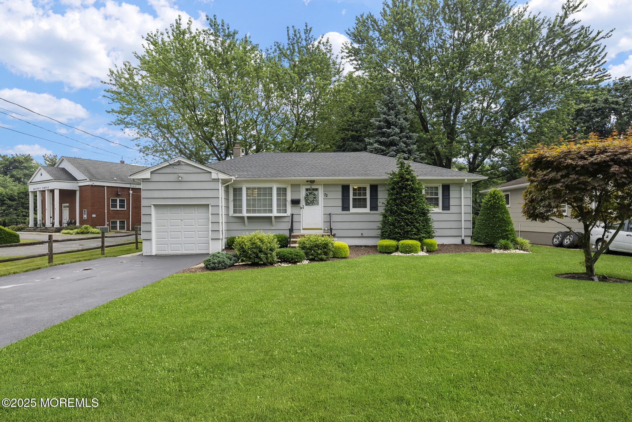72 Broadway Road Freehold, NJ 07728 - Photo 6 of 37 front view of a house and a yard