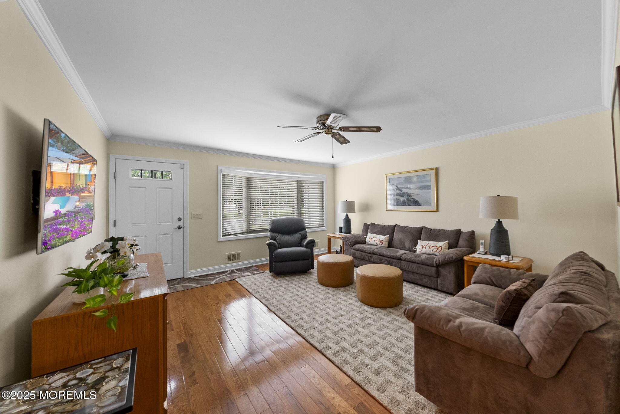 72 Broadway Road Freehold, NJ 07728 - Photo 8 of 37 a living room with furniture a couch and a flat screen tv