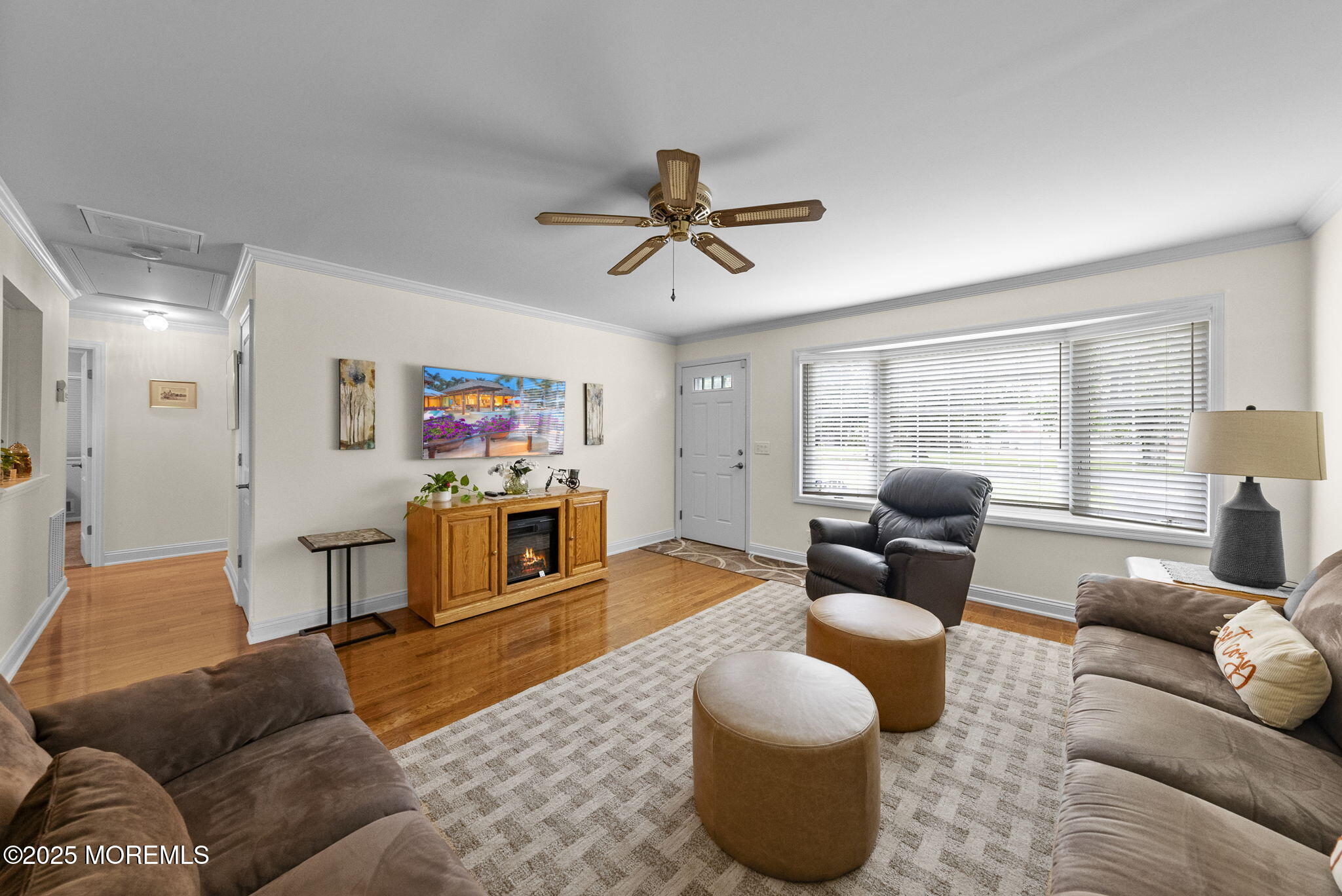 72 Broadway Road Freehold, NJ 07728 - Photo 10 of 37 a living room with furniture and a flat screen tv