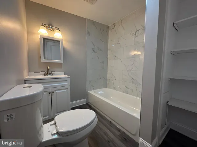 a view of a tree in a yard