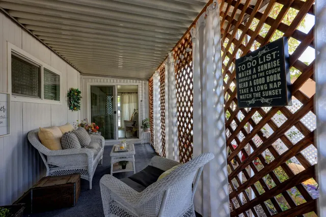 a view of porch with seating space