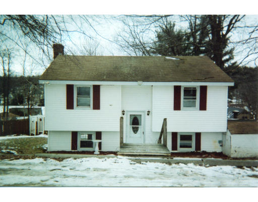 100 Park Road Charlton, MA 01507 - Photo 1 of 5 a front view of a house with a yard