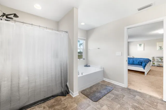 a swimming pool with outdoor seating and yard