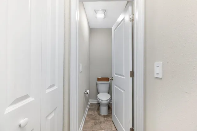 a view of a swimming pool with a lounge chair