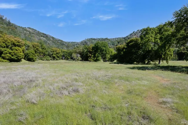 a view of outdoor space with mountain view