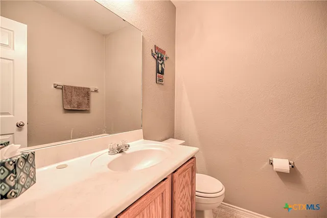 a bathroom with a sink and a toilet