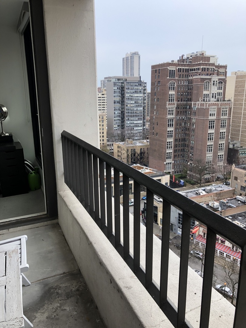 1030 North State Street, Unit 11G Chicago, IL 60610 - Photo 19 of 23 a view of city from a balcony