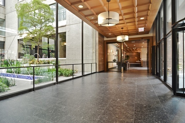 1030 North State Street, Unit 11G Chicago, IL 60610 - Photo 2 of 23 a view of steet with porch