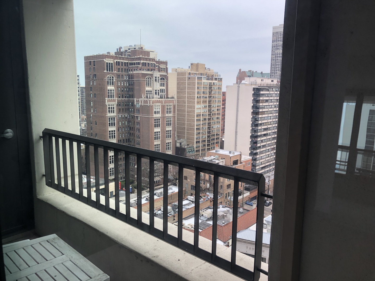 1030 North State Street, Unit 11G Chicago, IL 60610 - Photo 22 of 23 a view of a balcony with city view