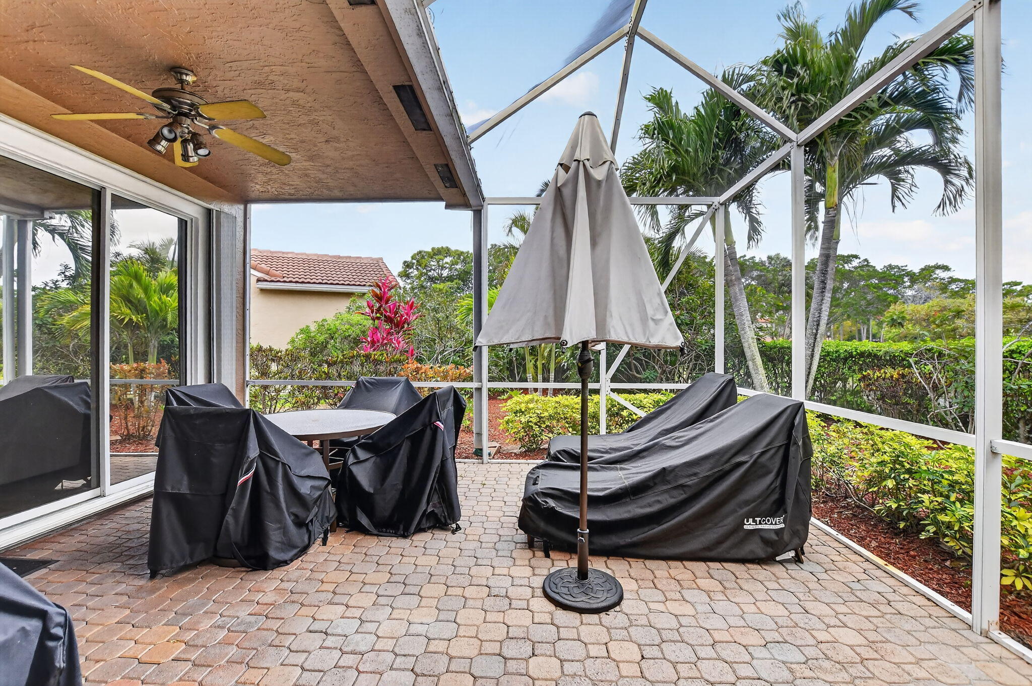 23478 Torre Circle Boca Raton, FL 33433 - Photo 30 of 44 Screen enclosed patio