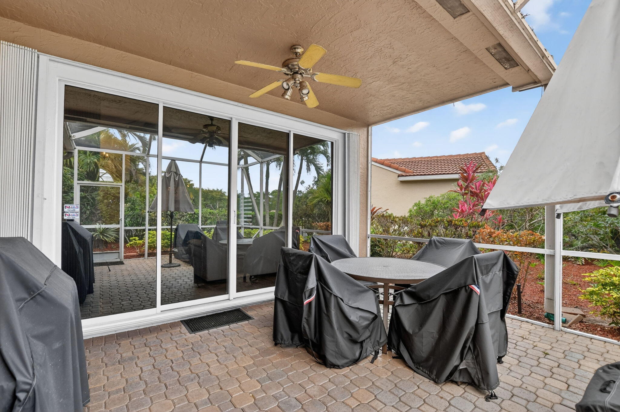 23478 Torre Circle Boca Raton, FL 33433 - Photo 32 of 44 screen enclosed patio