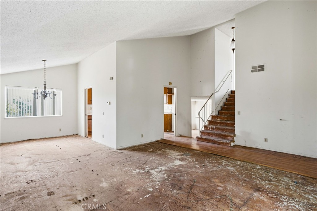 5131 Rotherham Circle Westminster, CA 92683 - Photo 8 of 50 a view of an empty room with stairs