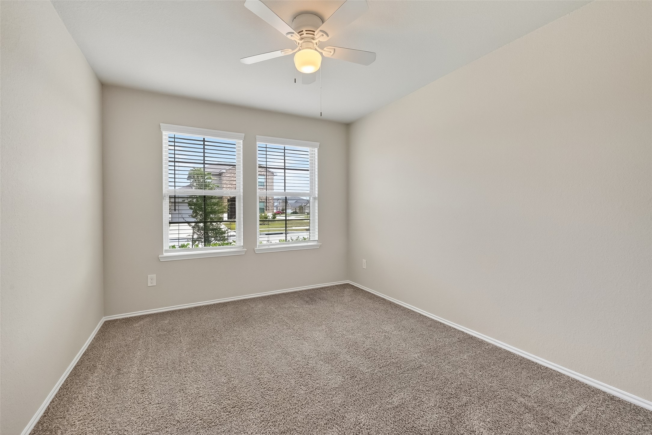 23511 Treeline Bluff Trail Spring Spring, TX 77373 - Photo 20 of 41 an empty room with a window and a fan