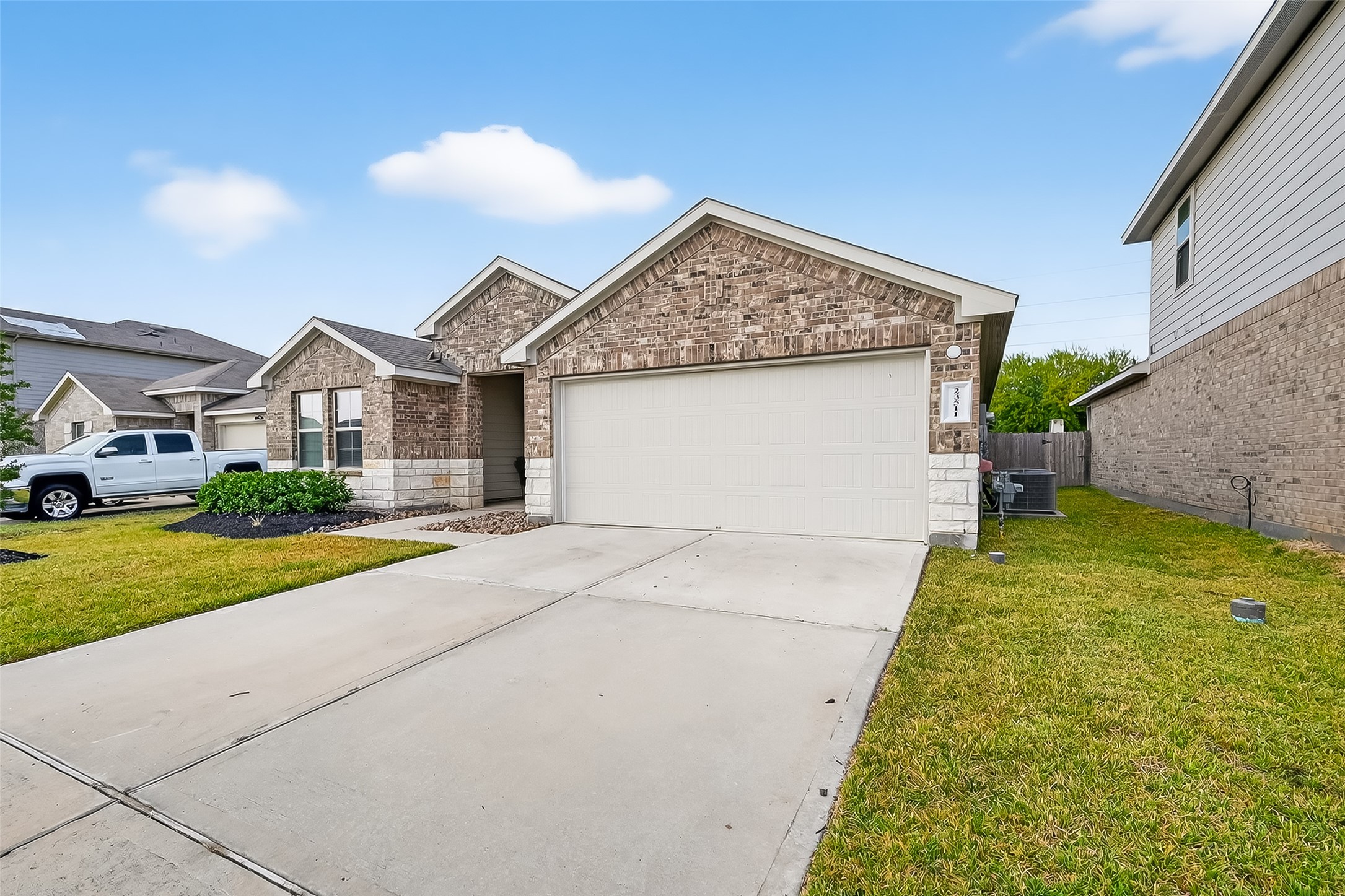 23511 Treeline Bluff Trail Spring Spring, TX 77373 - Photo 2 of 41 a front view of a house with garden